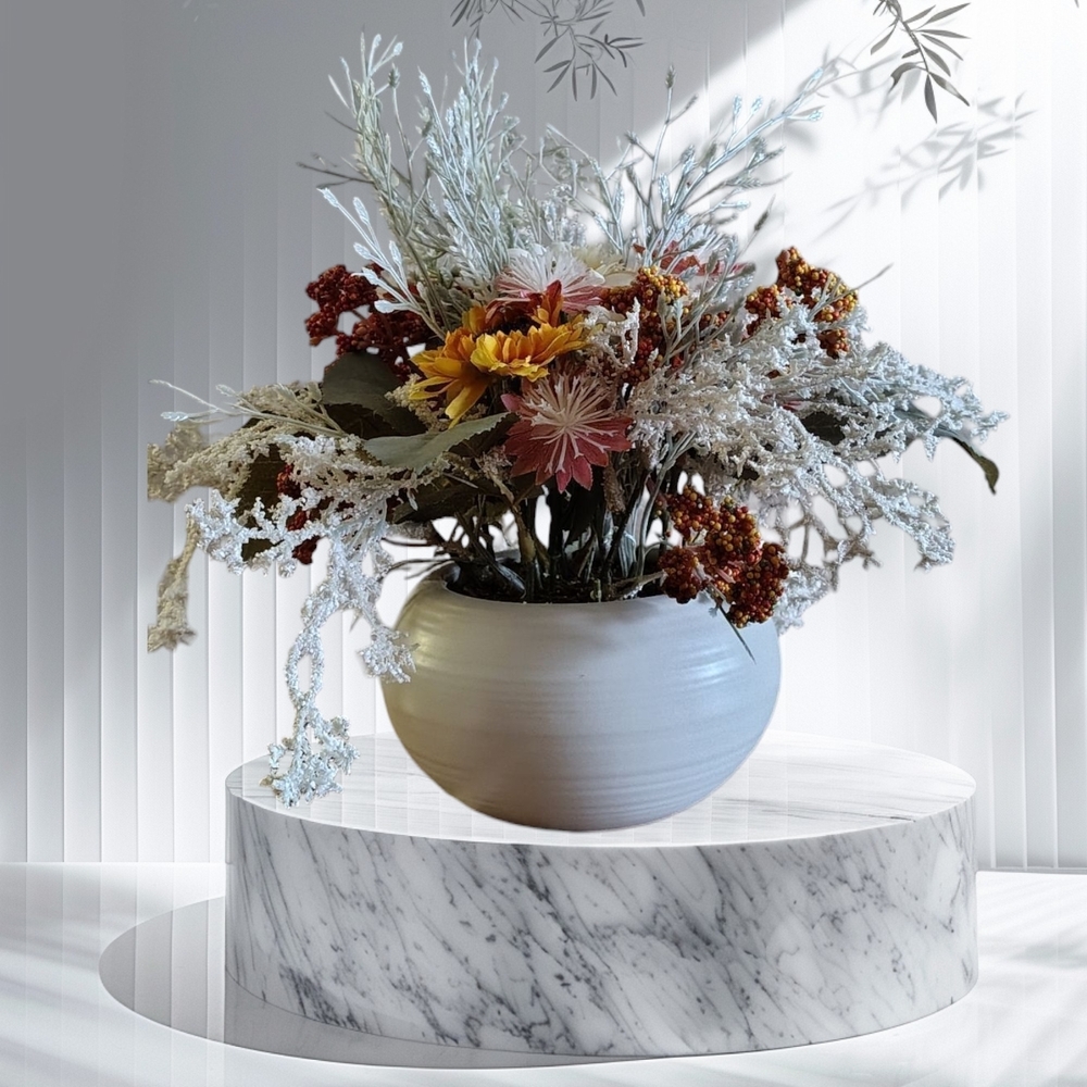 Floral Arrangement in White Ceramic Vase